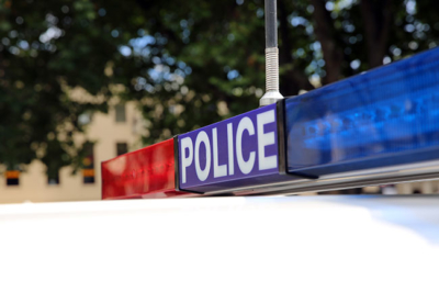 Police sign on car