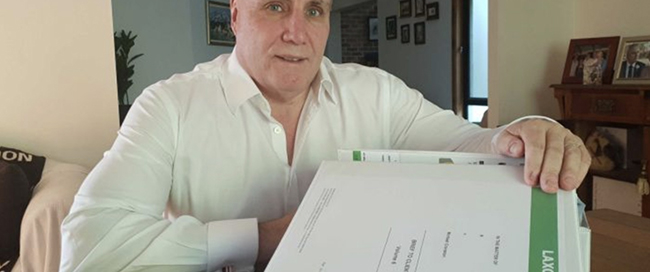 Michael Cranston with folder